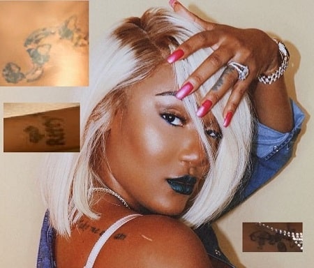 A picture compilation of Nya Lee's tattoos.